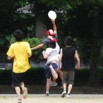 After a game of soccer, Michael engaged young Japanease kids in a game of ultimate frisbee!